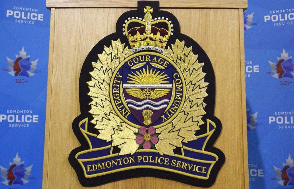 An Edmonton Police Services logo is shown at a press conference in Edmonton on Oct. 2, 2017. The Alberta government will provide an additional $1.6 million to create a new tool designed to help police officers respond to mental health crises. THE CANADIAN PRESS/Jason Franson.