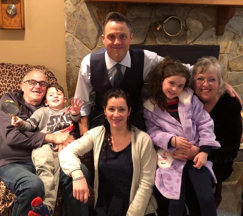 Carol and Ed with their son, Christopher, daughter-in-law, Tammy and grandkids, Journey and Beckham.