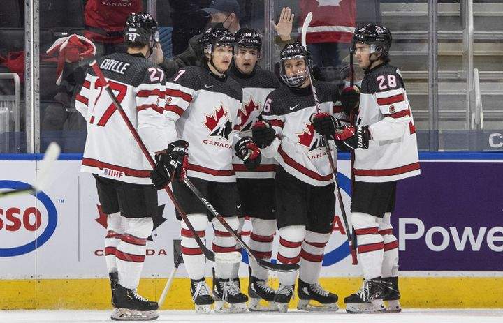 Canada celebrates a goal against Austria during first period IIHF World Junior Hockey Championship action in Edmonton on Tuesday, December 28, 2021.