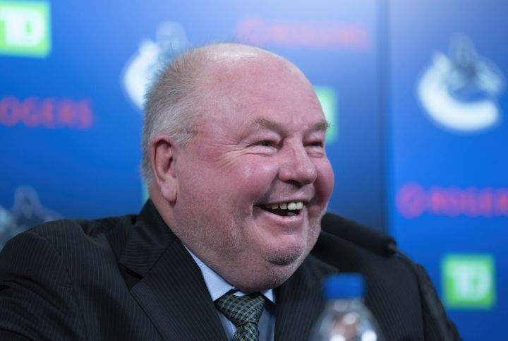 Vancouver Canucks new head coach Bruce Boudreau smiles as he attends a news conference in Vancouver, B.C., Monday, Dec. 6, 2021.