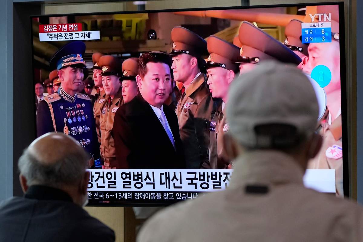 People watch a TV screen showing an image of North Korean leader Kim Jong Un during a news program at the Seoul Railway Station in Seoul, South Korea, Tuesday, Oct. 12, 2021.  (AP Photo/Ahn Young-joon).