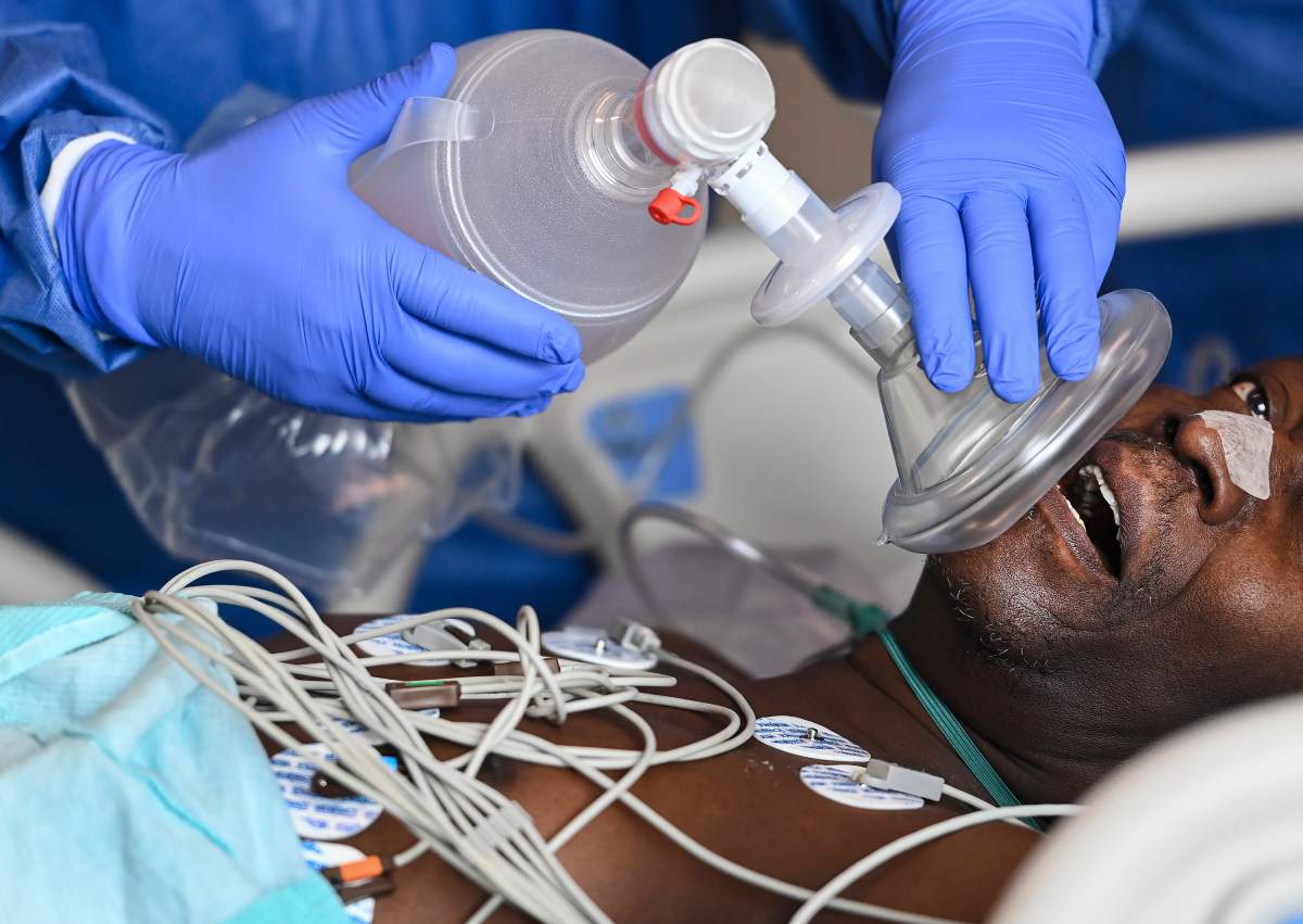 A 60-year-old COVID-19 patient fights for his life, desperately gasping for air as head intensivist Dr. Ali Ghafouri provides life saving medical care in an emergency situation in the intensive care unit at the Humber River Hospital during the COVID-19 pandemic in Toronto on Tuesday, April 13, 2021.
