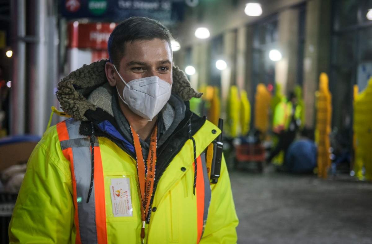 Outreach volunteer Chaz Smith offers help to the homeless on a -20C night in Calgary, Alta., Tuesday, Dec. 14, 2021.