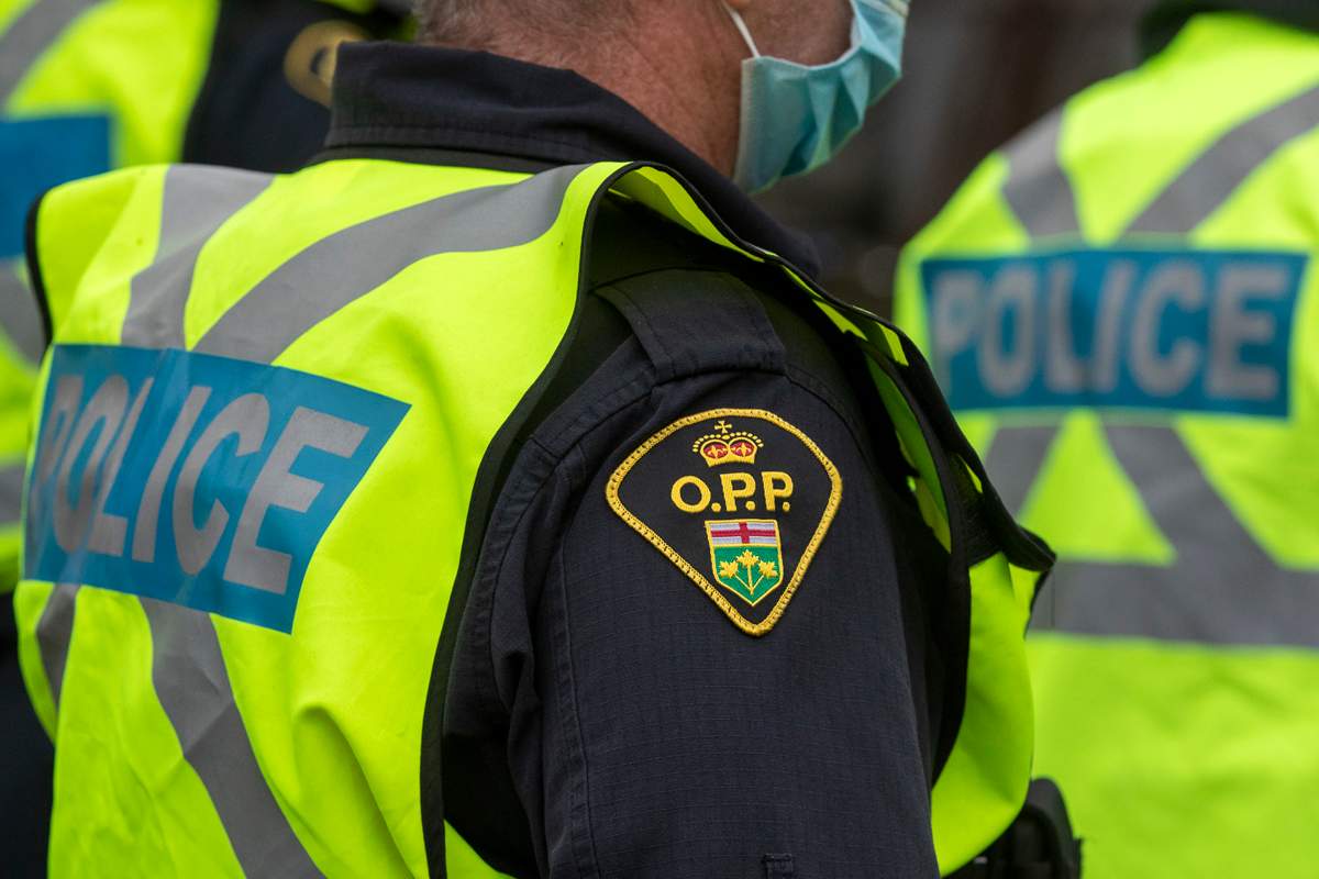 FILE-An Ontario Provincial Police officer in Kingston, Ontario on Saturday October 16, 2021. 