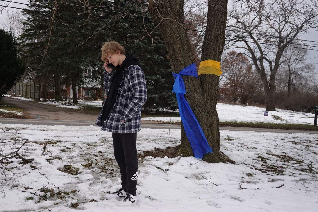 Logan Sweeney, a freshman at Oxford High School, speaks with a reporter about his experience during the shooting on December 01, 2021 in Oxford, Michigan.