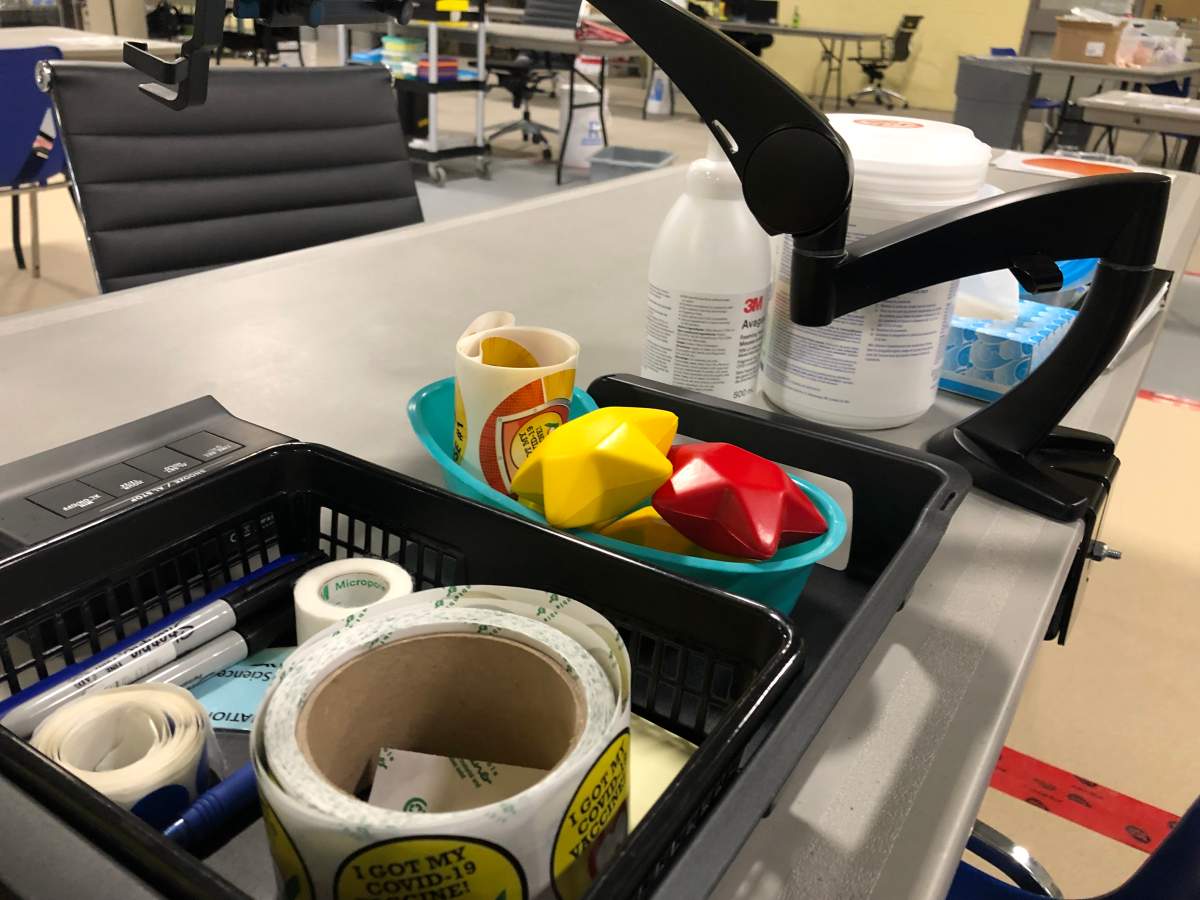 Stress-relieving plush toys and stickers are made available for children at vaccination stations in the kid-friendly clinic at the Western Fair District Agriplex.