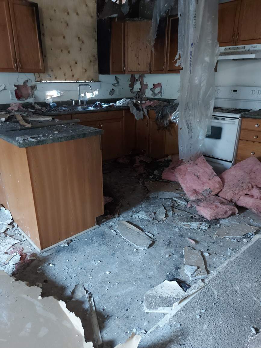 The Dean family says a fire caused significant damage to their kitchen, bathroom and bedrooms.