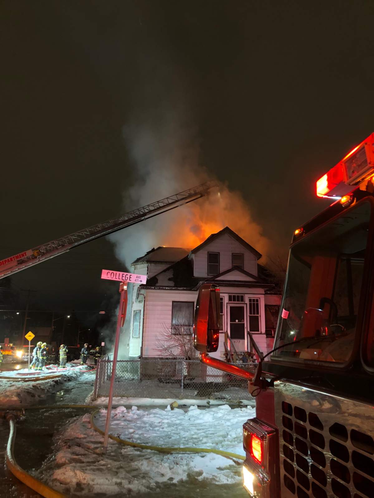 Winnipeg fire crews battle house fire on College - image