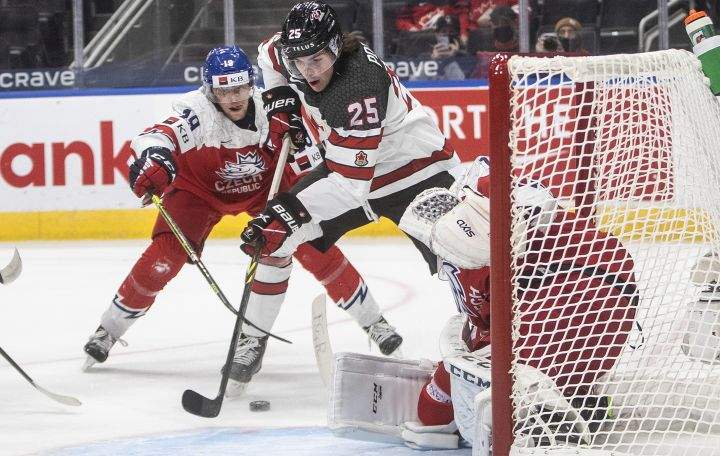 Canada’s Owen Power (25) is stopped by Czech Republic’s goalie Jakub Malek (1) as Jan Mysak (19) defends during first period IIHF World Junior Hockey Championship action in Edmonton on Sunday, December 26, 2021.