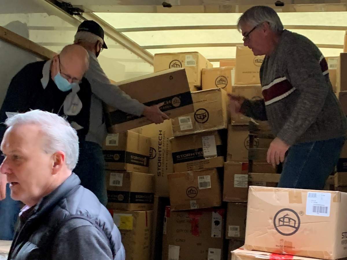 A photo showing boxes of new clothing being loaded into a van that was bound for Princeton, B.C., on Thursday.
