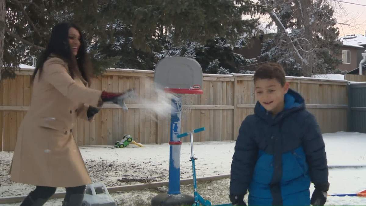 Susan Kumar playing with her son outside