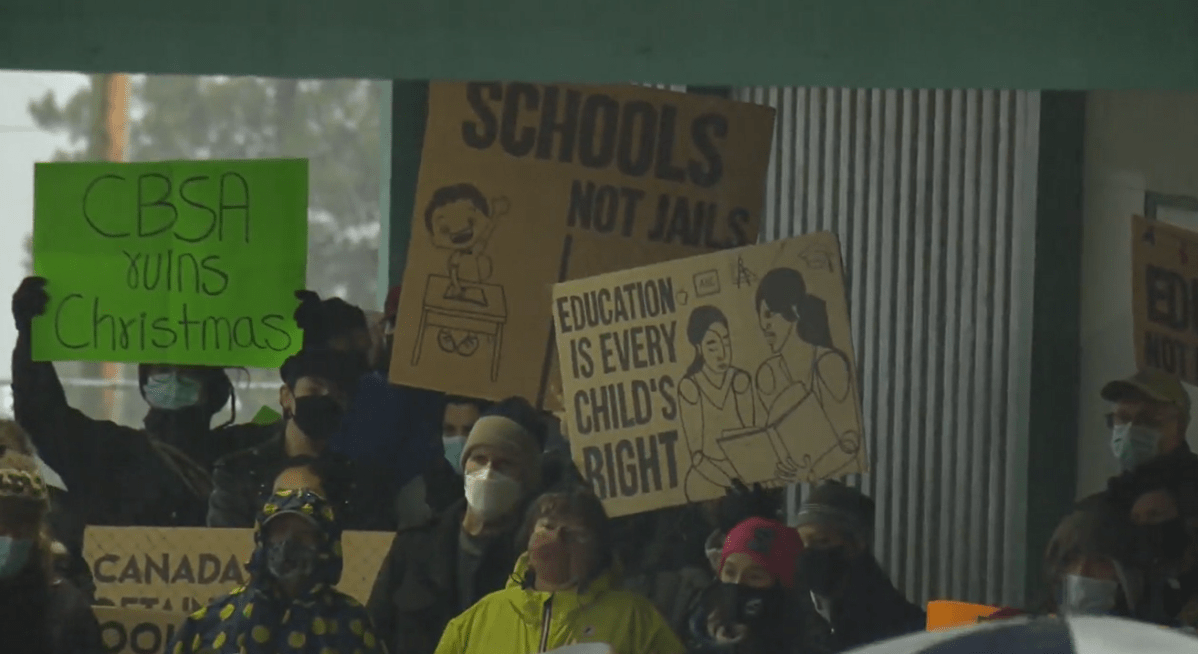 Parents and advocates for migrant rights demonstrate at Lord Tweedsmuir Elementary School in New Westminster on Saturday.