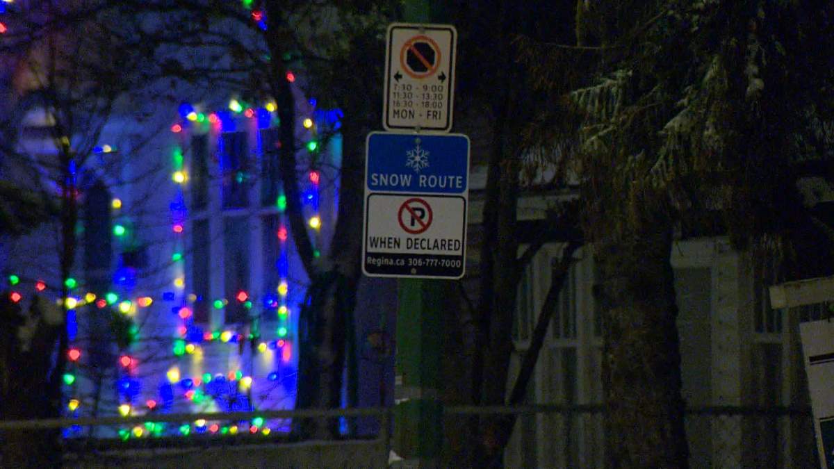 Blue signs with a white snowflake identify where there is no parking during the 24-hour ban.