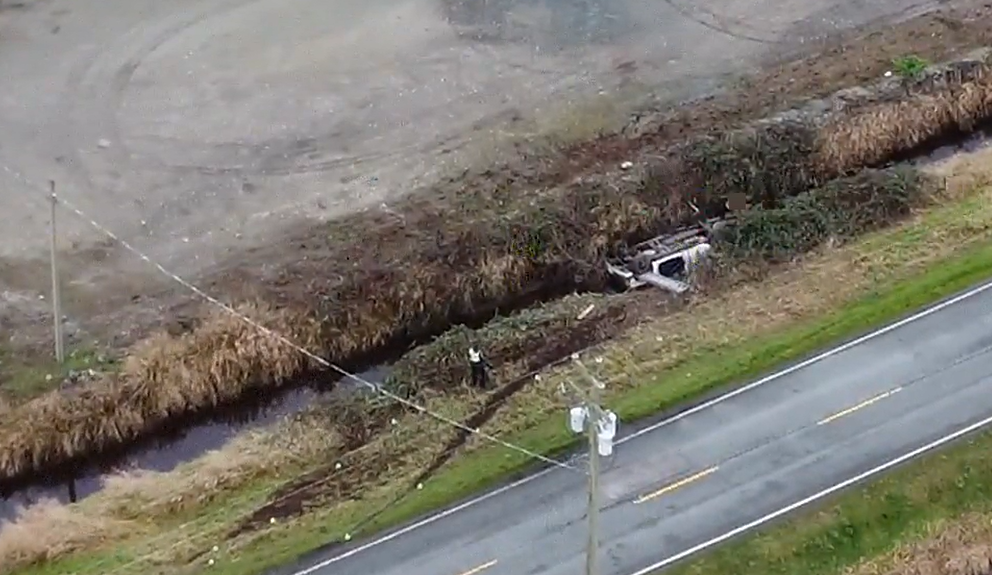 Police investigate a fatal crash in Surrey on Wednesday. 