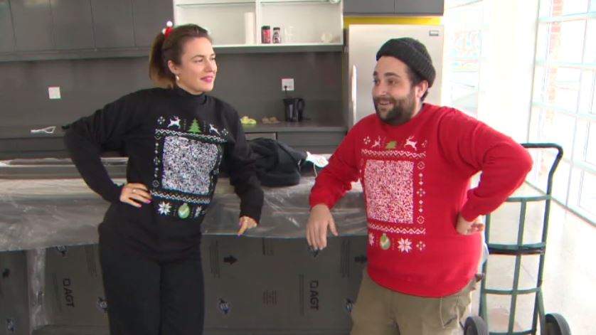 Festive jumpers come in the colours, red and black and display ‘functional’ QR code of wearer’s vaccine passport across the front.