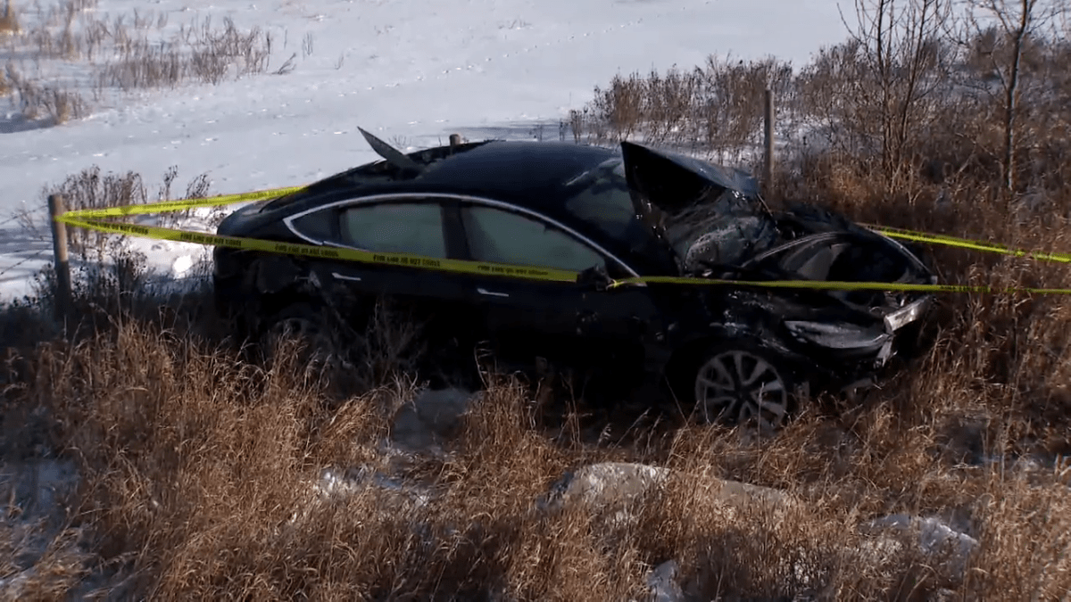 A vehicle sits in the ditch near Symons Valley Road and 144 Avenue N.W., after a collision that forced it off the road, on Dec. 24, 2021.