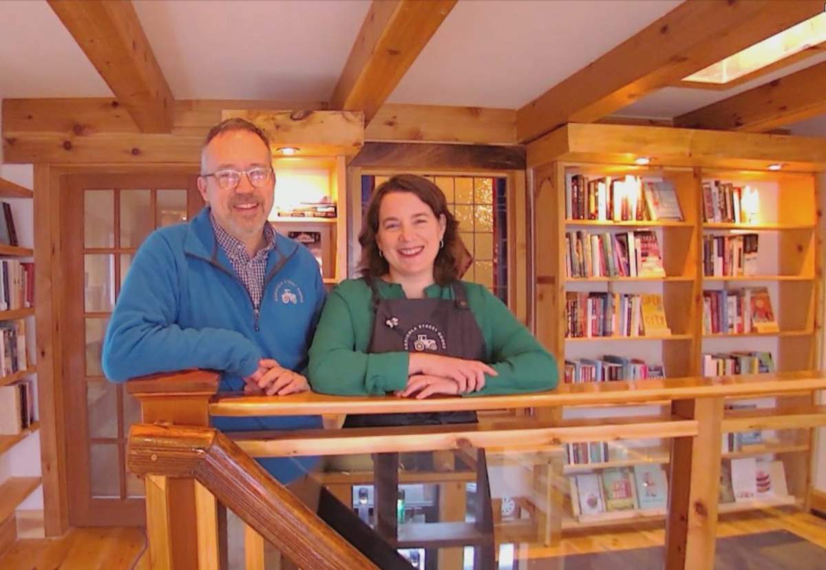 Nick Szymanis and Oona Craig, a couple from Ontario, are seen in their new secondhand bookstore in Halifax.