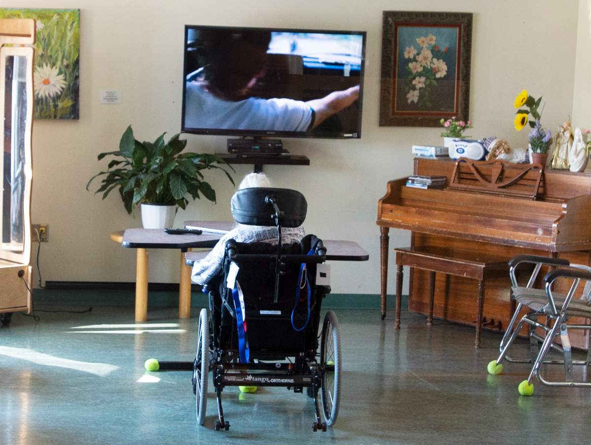 A resident watches television at CHSLD Rose-de-Lima seniors residence Friday, March 12, 2021 in Laval, Quebec. 
