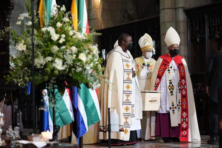 The coffin is carried out of the cathedral at the end of the funeral service for Anglican Archbishop Emeritus Desmond Tutu in St. George’s Cathedral in Cape Town, South Africa, Saturday, Jan. 1, 2022.