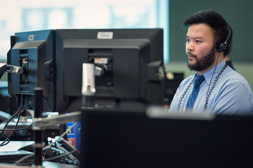 An E-Comm operator fields a 911 call from a centre in B.C.'s Lower Mainland.