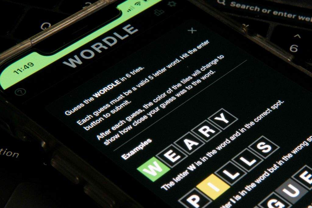 In this photo illustration, the word game Wordle is shown on a mobile phone.