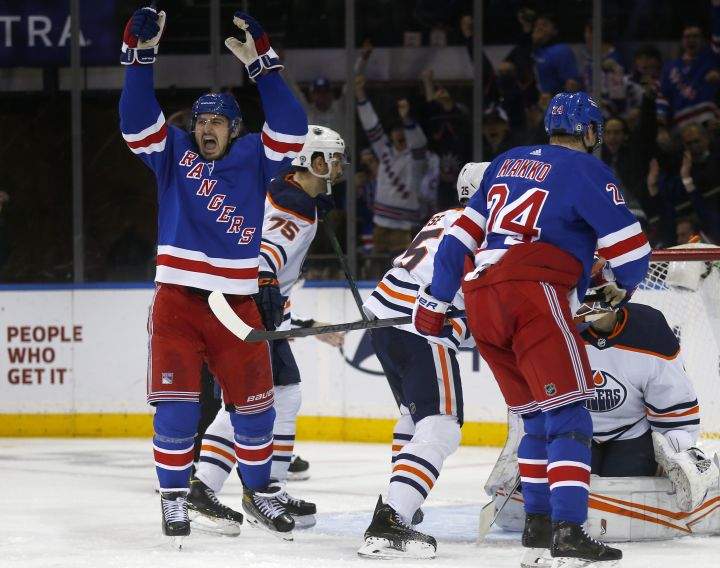 New York Rangers’ Chris Kreider (20) celebrates his power-play goal against the Edmonton Oilers during the third period of an NHL hockey game, Monday, Jan. 3, 2022, in New York. The Rangers won 4-1.