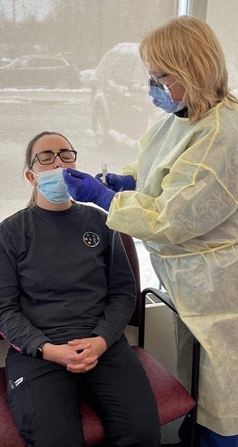 Lynn Knight, a retired LPN, has been working at vaccination clinics and testing centres in the northern health zone since the COVID-19 pandemic began