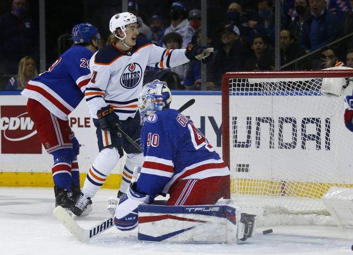 Edmonton Oilers’ Ryan McLeod (71) celebrates his goal against New York Rangers’ goalie Alexandar Georgiev (40) during the second period of an NHL hockey game Monday, Jan. 3, 2022, in New York.