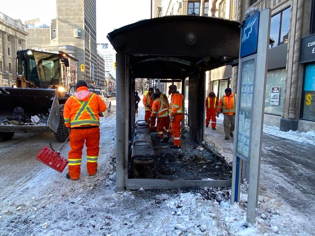 The aftermath of a downtown bus shelter fire.