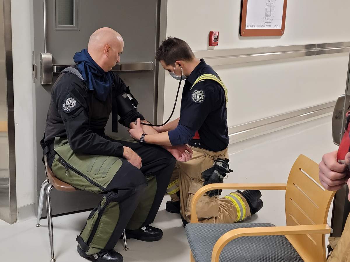 RPS explosives/chemical disposal experts and Regina FIre prepare for hazardous chemical removal.