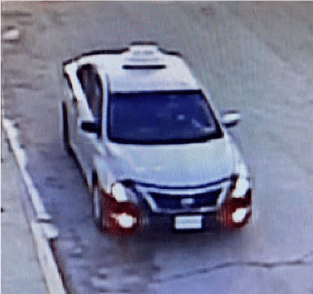 The suspect vehicle is described as a 4-door sedan with a ‘fake’ taxi sign on the roof. The vehicle is believed to be a 2014 Silver Nissan Altima.