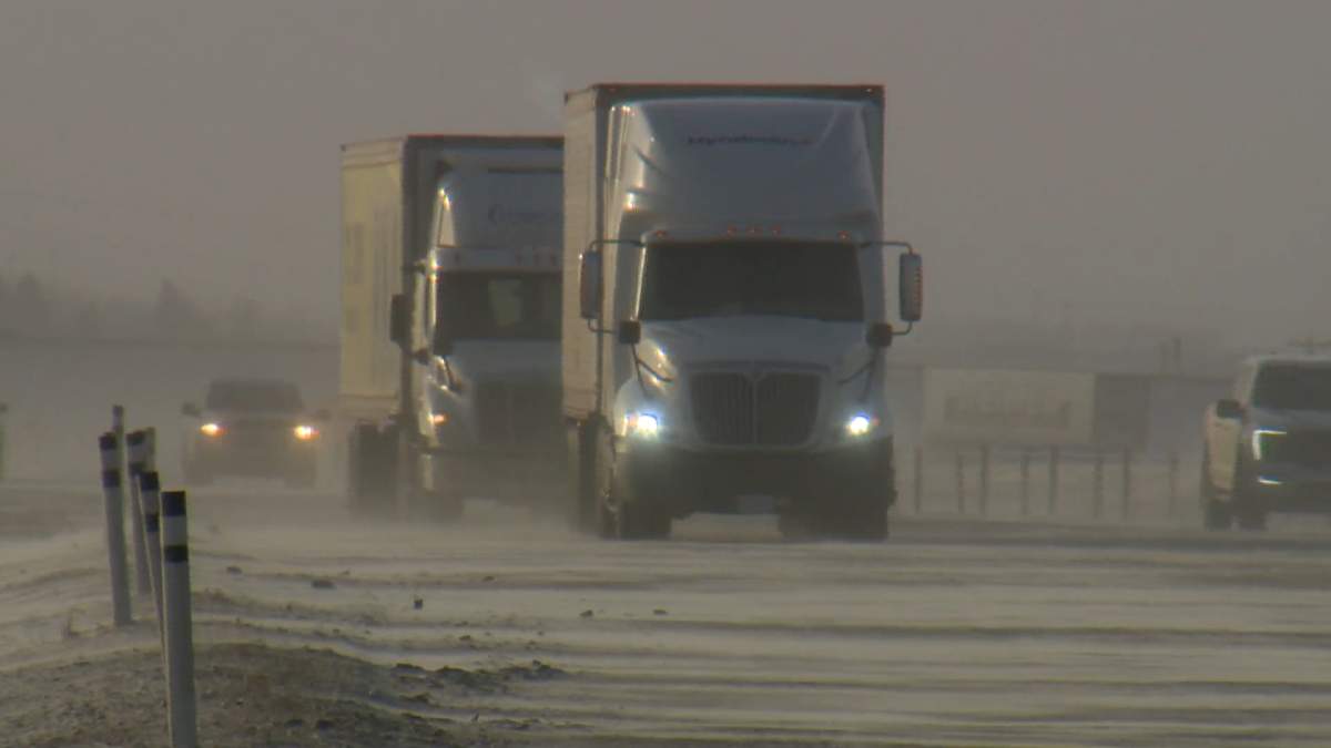 travel snow QE2 Highway winter roads semi 1