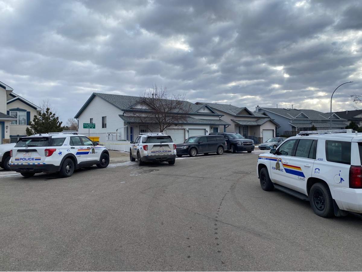 Airdrie RCMP investigate in the Willowbrook neighbourhood near the pathway along Nose Creek Wednesday, Jan. 26, 2022.