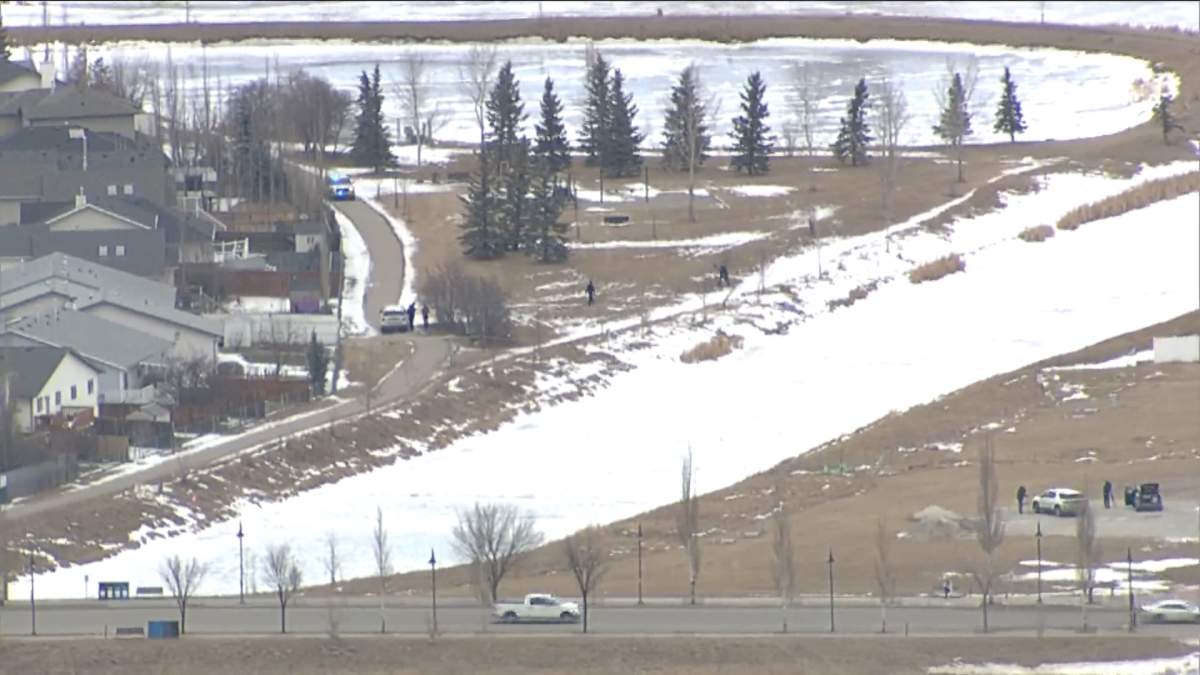 Airdrie RCMP investigate in the Willowbrook neighbourhood near the pathway along Nose Creek Wednesday, Jan. 26, 2022.