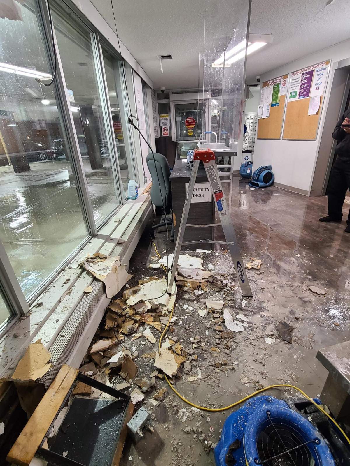 Bridgeland apartment building residents cleaning up after multiple floods - image