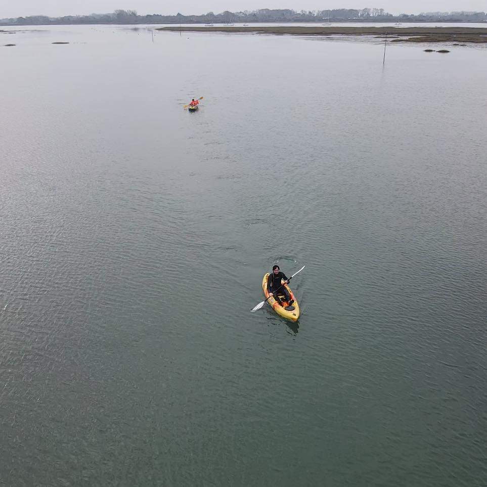 A kayak rescue team heads out to the mudflats to try and rescue Millie.