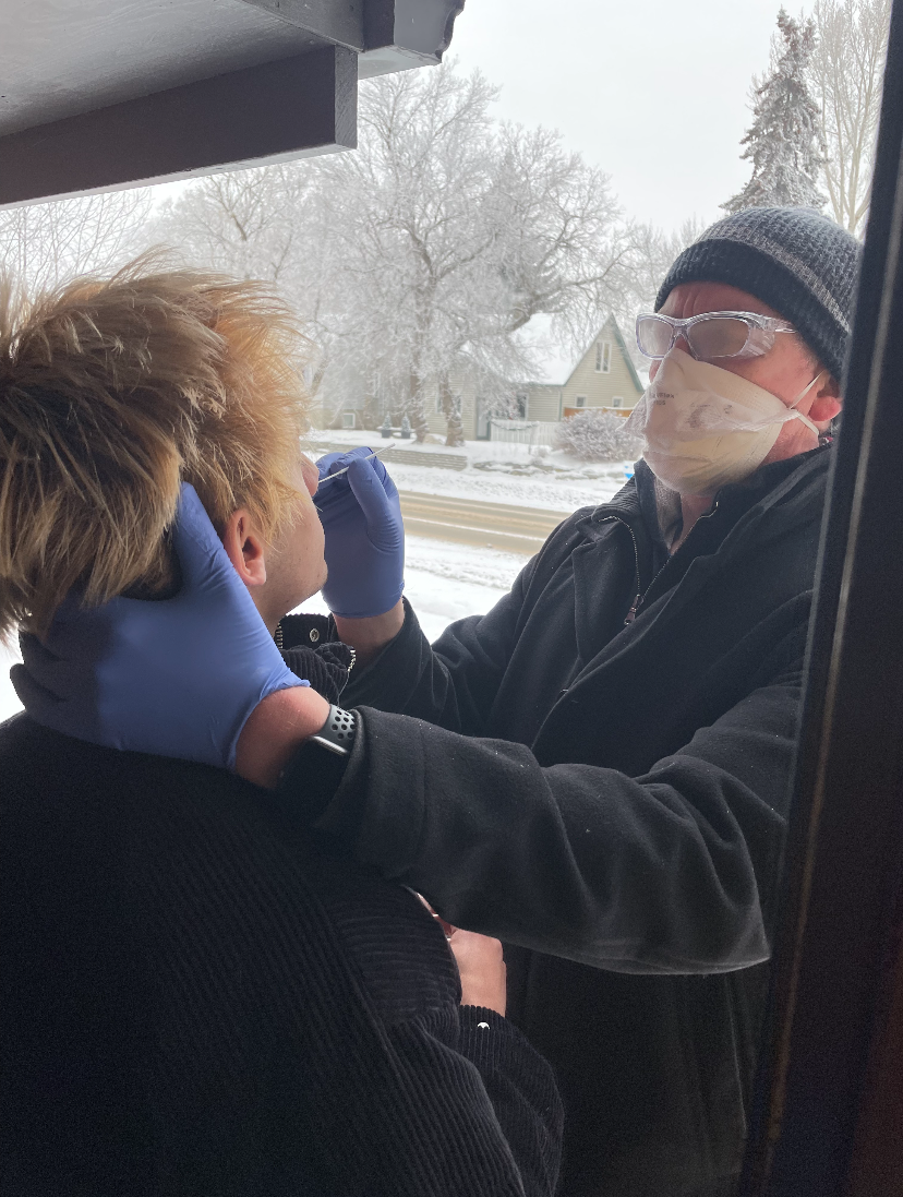 Dr. Keegan performing test on Yates-Laberge’s son.