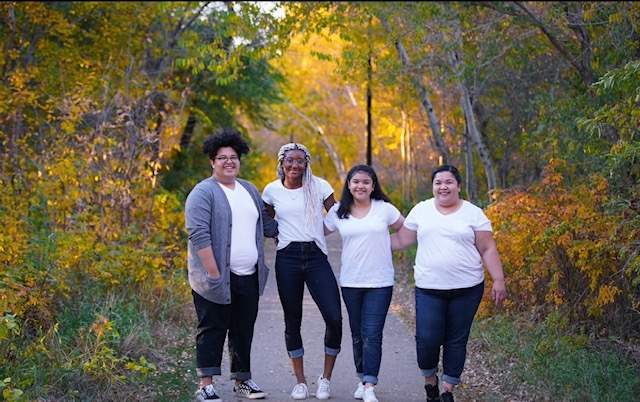 Dawn Richardson Wilson, who is competing for Team Canada in the 2022 Beijing Olympics, seen here with her family.