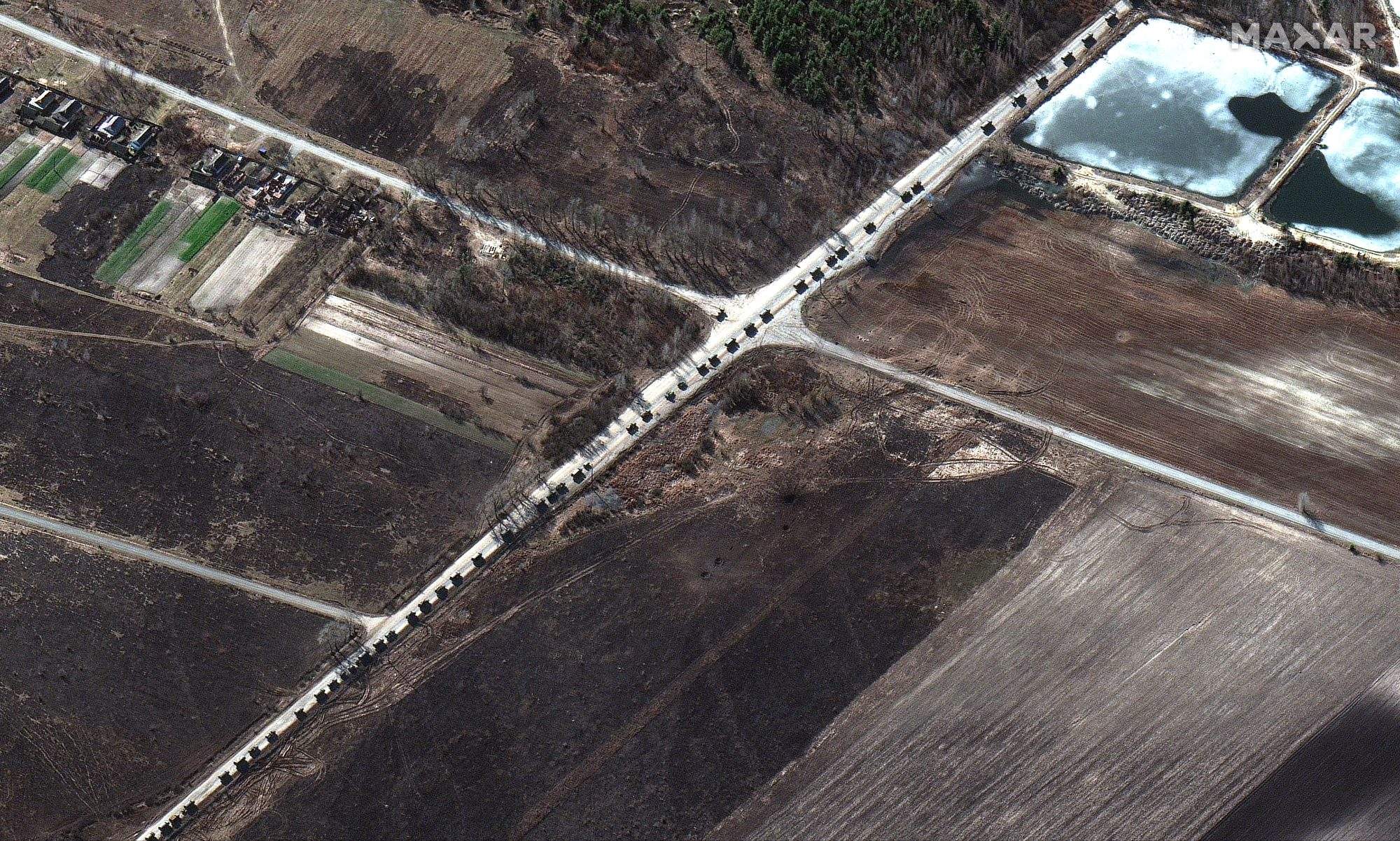 A large military convoy seen north of Kyiv stretches from near Antonov airport in the south to the northern end of the convoy near Prybirsk, Ukraine on Feb. 28, 2022..