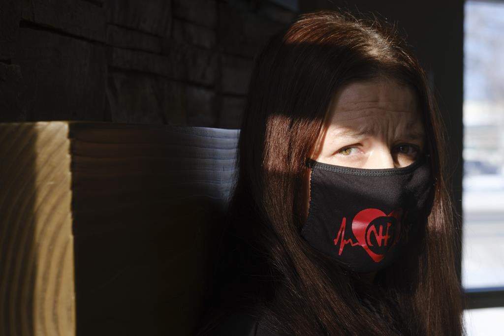 Melanie Hodge poses for a photo at a Tim Hortons in Regina on Wednesday, Feb. 2, 2022. Hodge, who has used drugs, says she has experienced barriers when trying to get access to health care and cervical screenings. THE CANADIAN PRESS/Michael Bell.