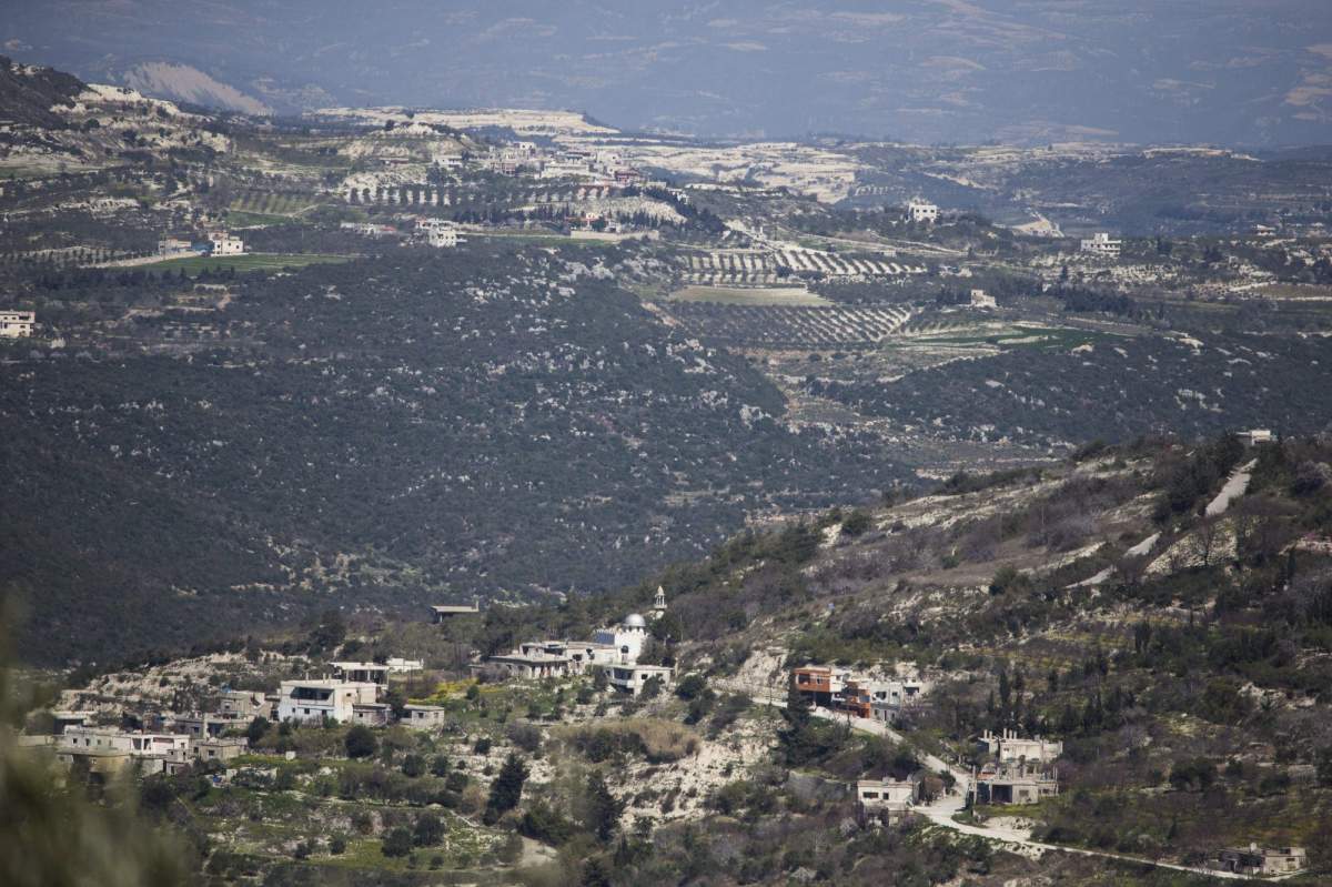 FILE -- This March 1, 2016 file photo, shows a view towards the Turkish border from Kinsibba, Syria. 