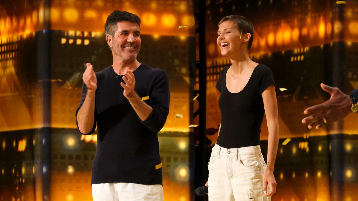 Simon Cowell and Nightbirde are seen onstage following her audition performance.