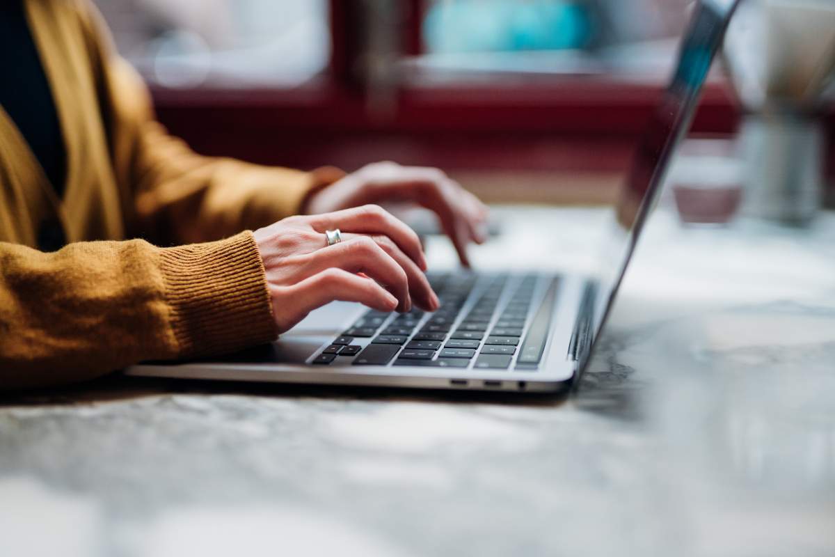File photo. Typing on a laptop.