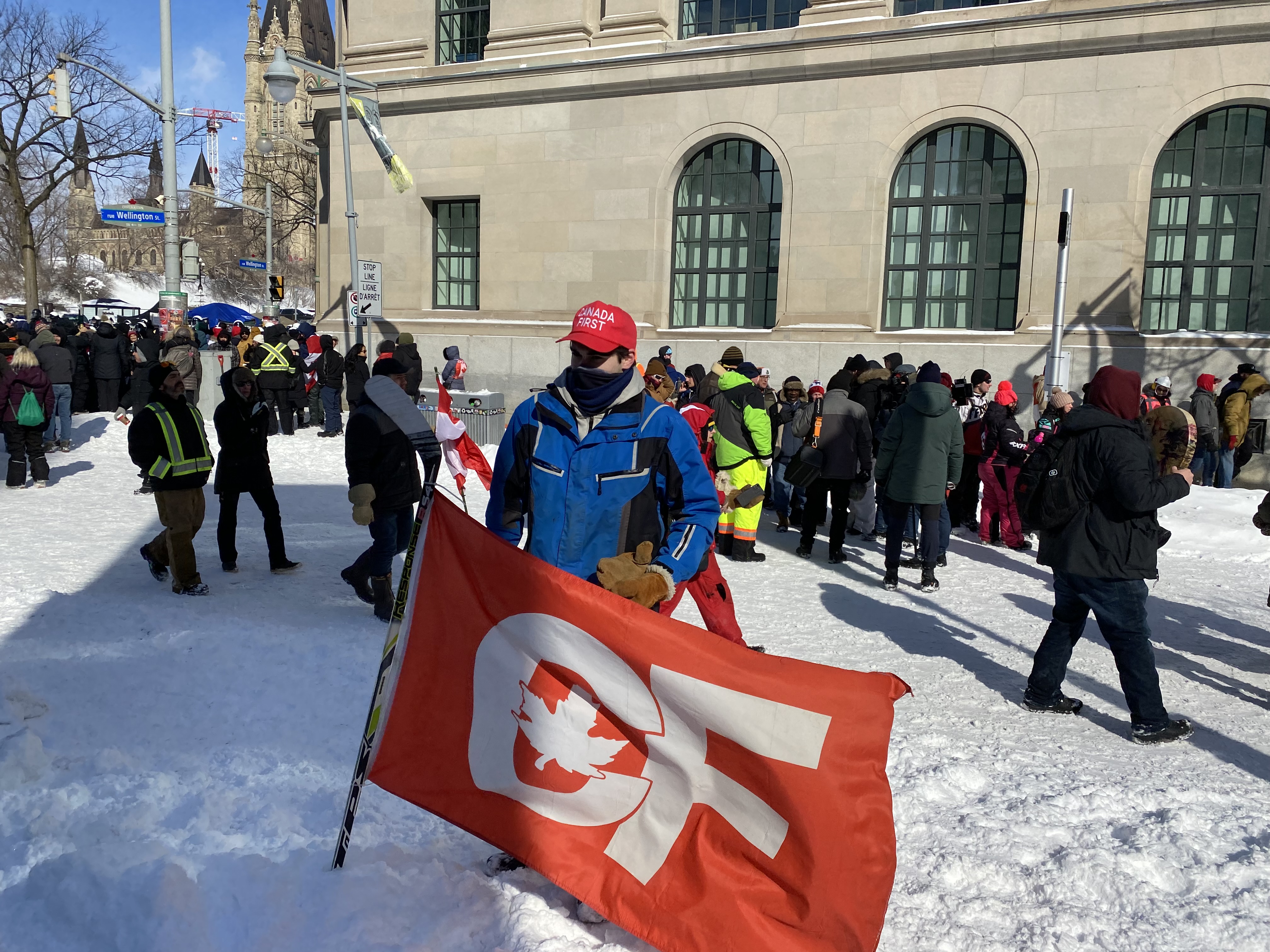A supporter of Canada First, a group described as white nationalists by anti-hate advocates, attends the convoy protests in Ottawa on Feb. 19, 2022. Canada First was one among several far-right groups that participated or supported the so-called ‘Freedom Convoy.’