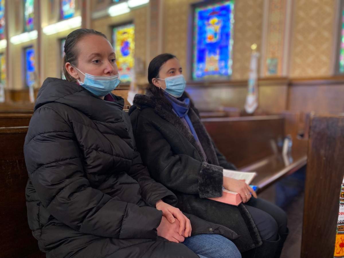 Ukrainian-Canadian praying in Winnipeg