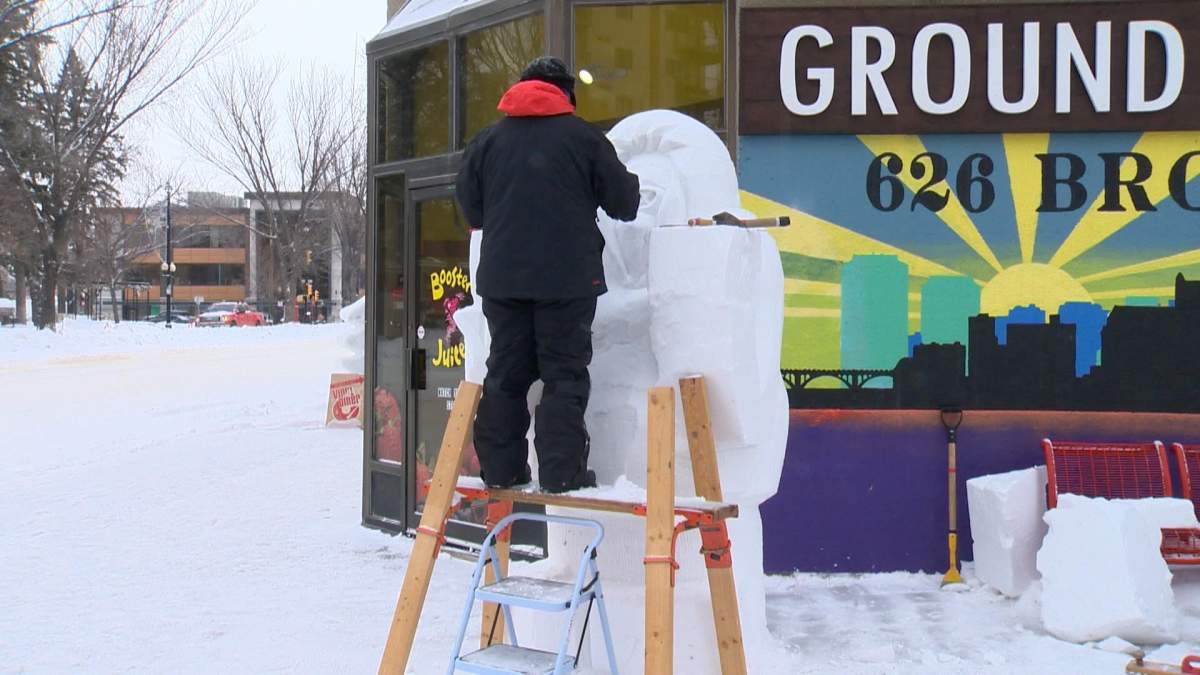 Pro sculptor Theressa Wright working on an eight foot yeti snow monster in Saskatoon.