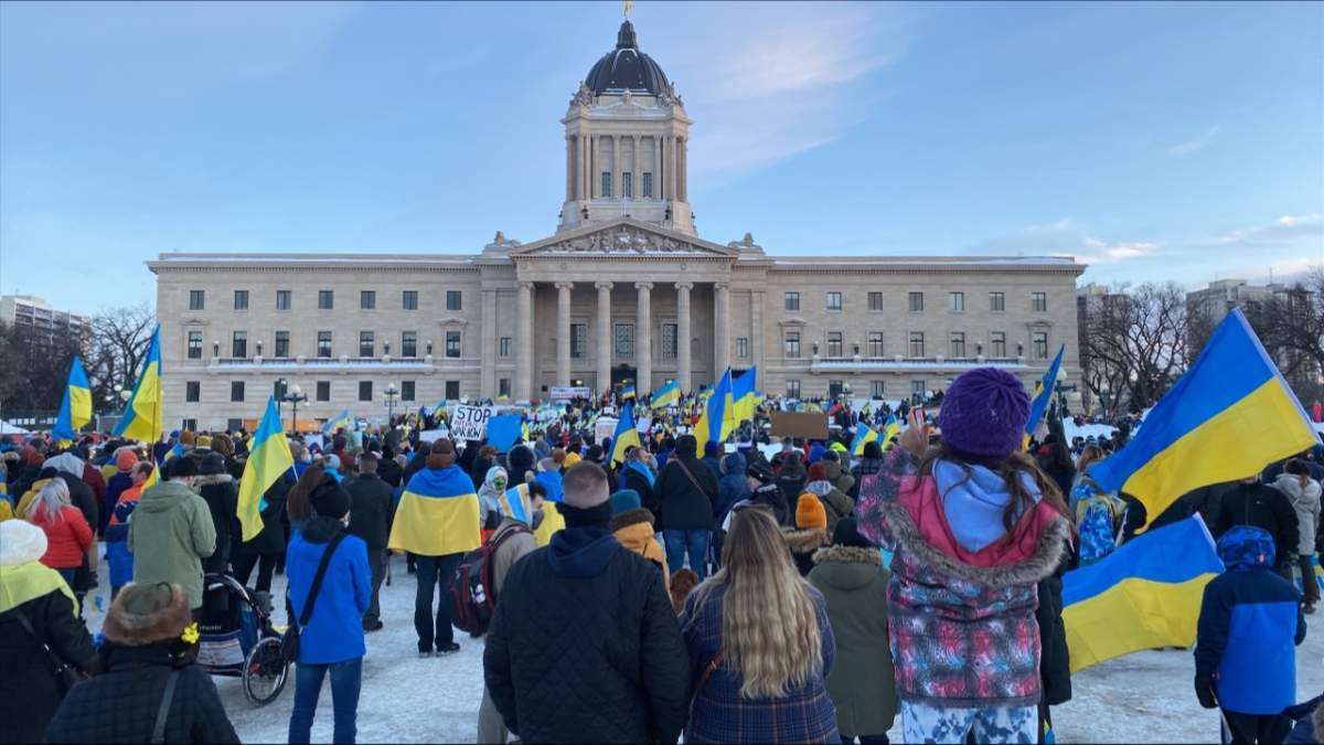 Hundreds gather on the grounds of the Manitoba Legislative Building Feb. 26 for a show of solidarity with Ukraine.