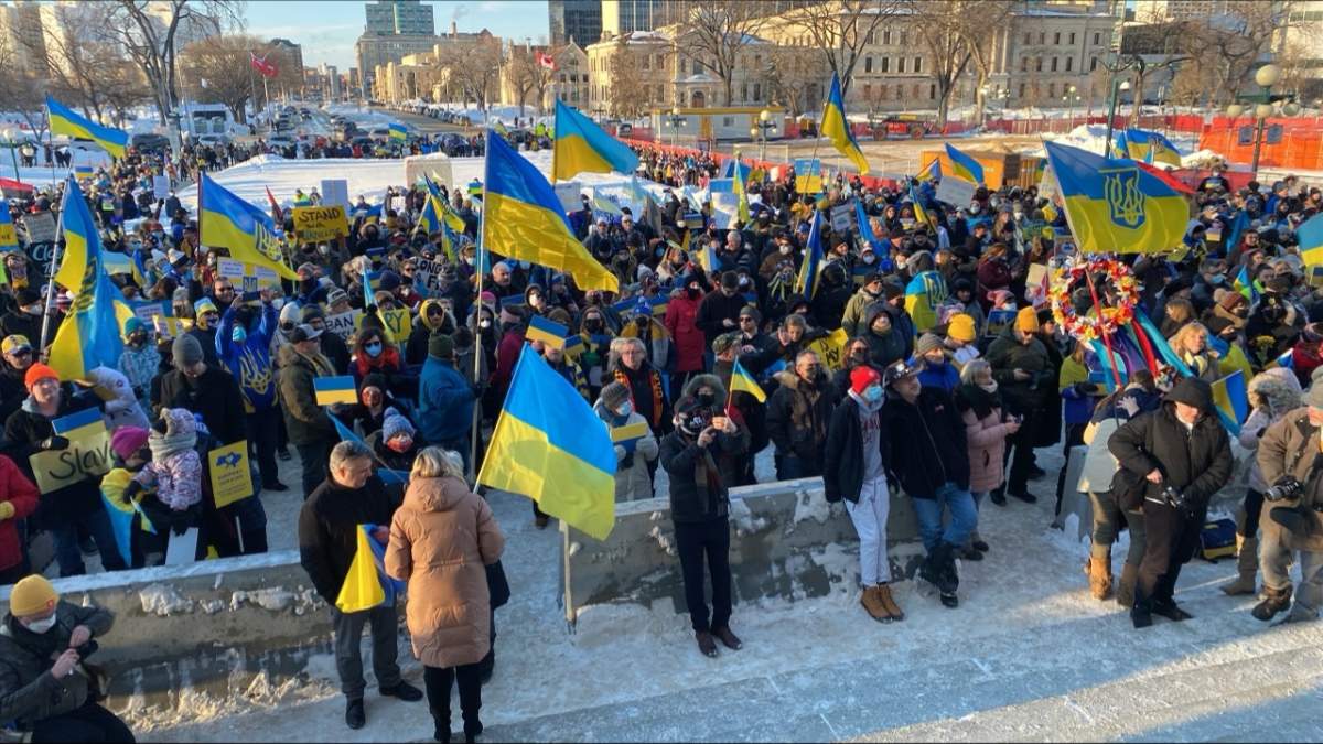 Hundreds gather on the grounds of the Manitoba Legislative Building Saturday afternoon for a show of solidarity with Ukraine.
