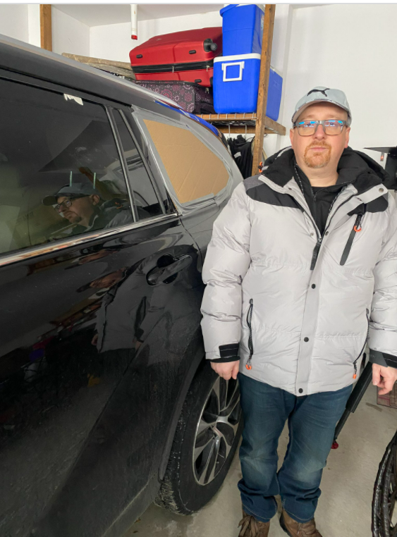 Michael Abrosimov says he, his wife and their two children were headed to a rally in solidarity with Ukraine on Sunday when a man ripped the Ukraine flag off of their car and smashed the window.