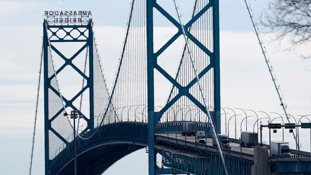 trucks cross Ambassador Bridge
